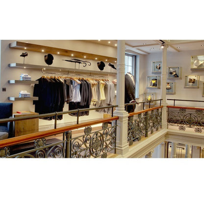 Retail clothing display lighting using Soraa SNAP 4 inch circular beam spreader 36 degree lens