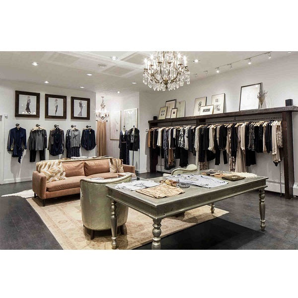 Retail clothing display lighting using Soraa SNAP 4 inch circular beam spreader 60 degree lens